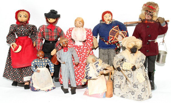 FOLK ART NUT DOLLS & APPLE HEAD DOLLS, NINE, : FOLK ART NUT DOLLS & APPLE HEAD DOLLS, NINE, H 4 1/2"-10":Including 1 Rene Robert of Quebec trapper, H. 8 1/2"; 2 Mississippi pecan dolls, one male and one female, H. 5"-6" (male's foot is detached); 