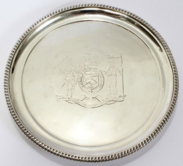 ENGLISH STERLING SILVER WINE COASTER, C. 1920,: ENGLISH STERLING SILVER WINE COASTER, C. 1920, DIA 5":having an English family crest on top with English silver marks on side; 5 1/2 Dia
