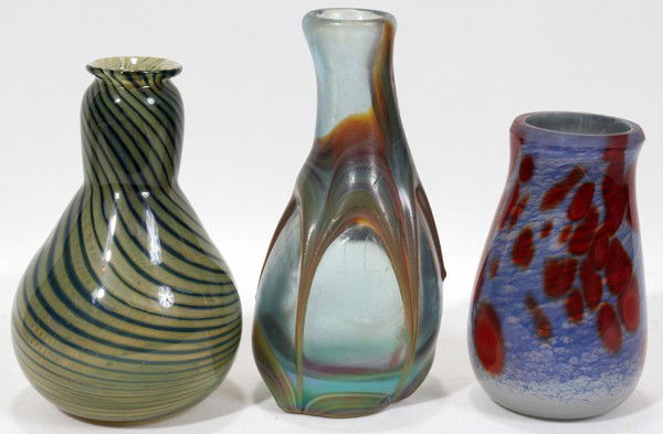 CONTEMPORARY BLOWN GLASS VASES, 3, H 8" - 11": CONTEMPORARY BLOWN GLASS VASES, THREE, H 8" - 11":Two by John Sullivan. One green and blue swirl form vase, one blue & light blue with rust dots.