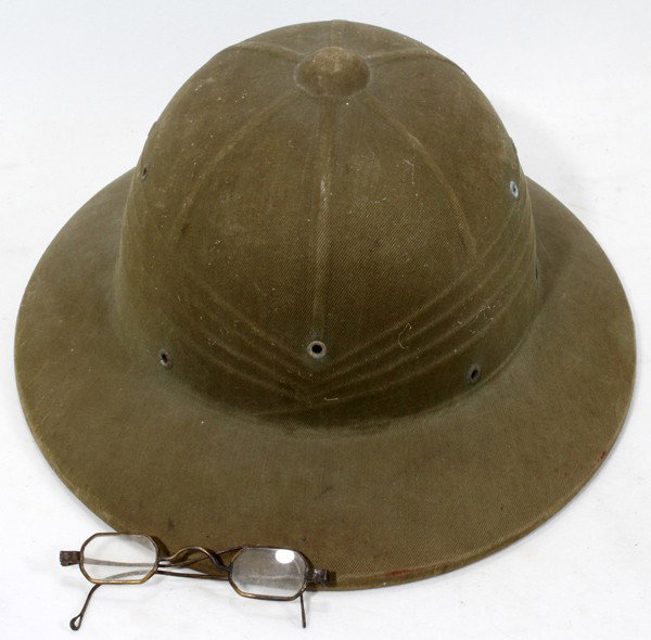SAFARI HAT & OCTAGONAL SPECTACLES, H 4 1/2"-14": SAFARI HAT & OCTAGONAL SPECTACLES, H 4 1/2"-14":Including 1 "Hawley Products Co." safari hard hat, dated Aug. 9, 1948, stamped in interior, and 1 pair of wire frame octagonal spectacles. Two pieces to