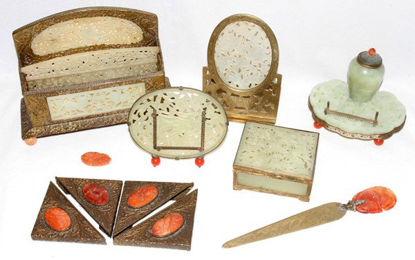 CHINESE JADE & CARNELIAN DESK ACCESSORIES: CHINESE JADE & CARNELIAN DESK ACCESSORIES, ELEVEN PIECES:Including 1 inkwell with carnelian feet, L 5", H 4", W 4"; 1 letter holder, L 8" H 6", D 3 1/2"; 1 bookend, H 6"; 1 letter opener L 9"; 1 blott
