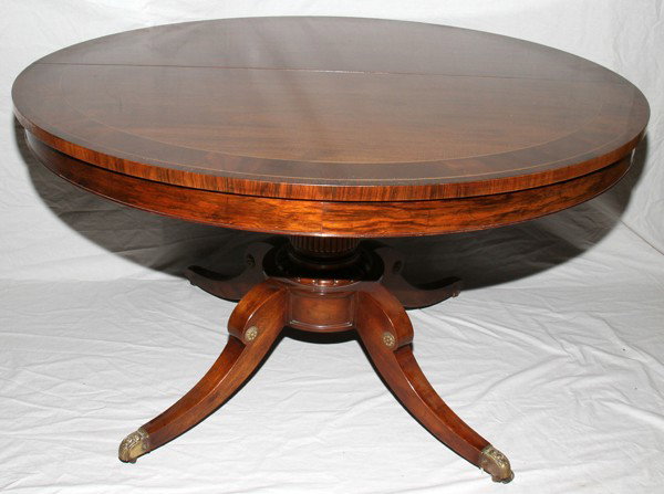 FEDERAL STYLE ROUND MAHOGANY DINING TABLE: FEDERAL STYLE ROUND MAHOGANY DINING TABLE, DIA 50", OPENS TO 98":With pedestal base and three leaves, 16" (opens to 98"). Satinwood string inlay. Rosewood band. Three extensions have aprons.