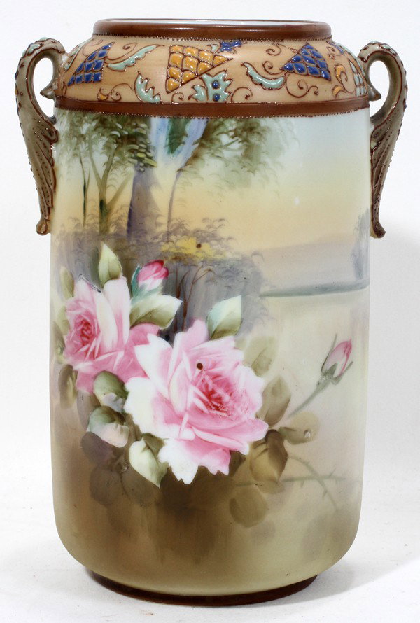 NIPPON ENAMELED PORCELAIN VASE, H 8 3/4": NIPPON ENAMELED PORCELAIN VASE, H 8 3/4":Decorated with roses; leaf side handles; raised enamel work.