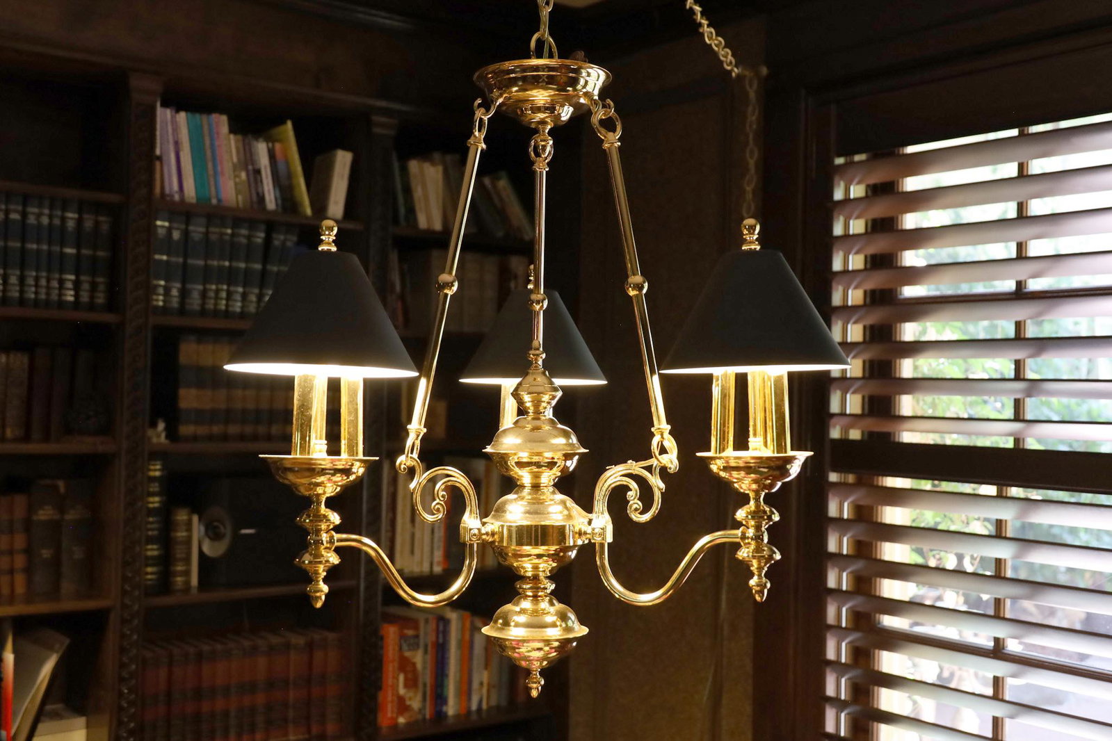 Gold Plate Three Arm, Nine Light Chandelier H 28’’ Dia. 23’’: Gold Plate Three Arm, Nine Light Chandelier H 28'' Dia. 23'' Regency style. Suspended from chains. Property of a prominent Central Avenue, Bay City, MI collector.