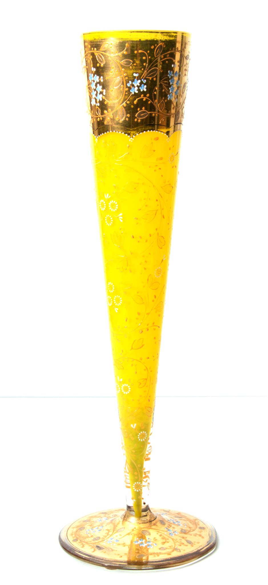 Tall Yellow Glass Vessel, Gold and Enamel C 1880 H 15”: TALL YELLOW GLASS VESSEL, GOLD AND ENAMEL C 1880 H 15" Cone shape. Cased glass with gold flash at top and base. Hand blown. Blue forget me nots in enamel on gold.