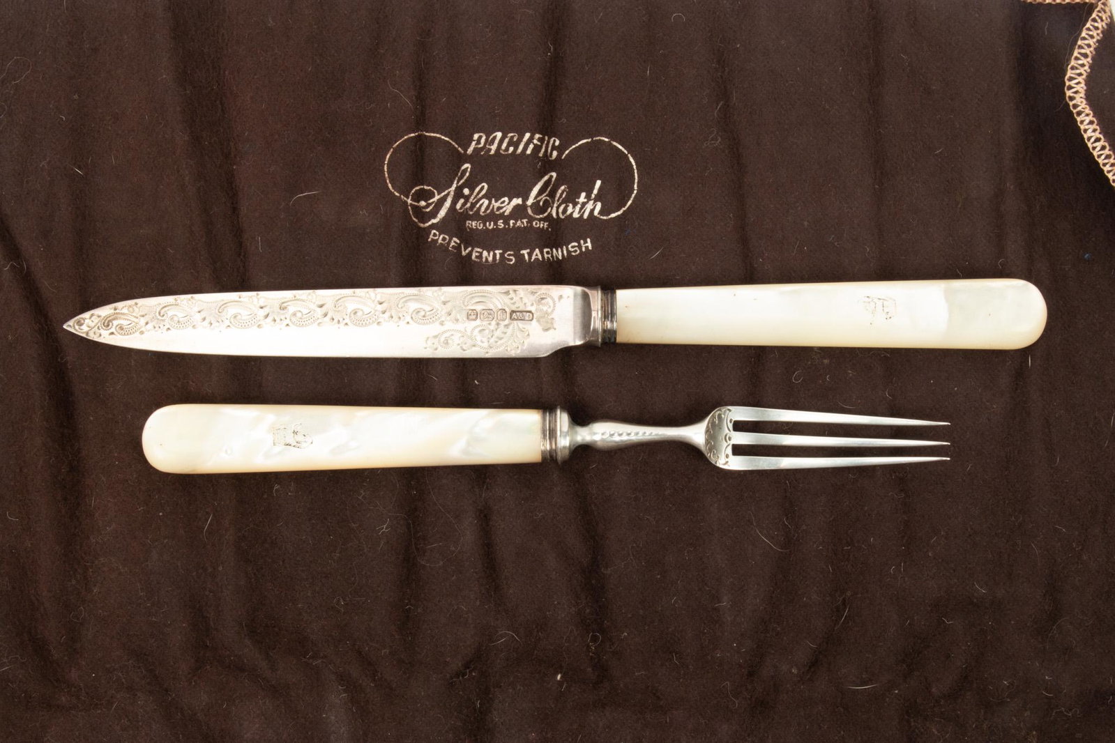 Allen & Darwin, Sheffield, Sterling Silver and Mother of Pearl Fruit Service, C. 1897-8, 24 Pcs: ALLEN & DARWIN, SHEFFIELD, STERLING SILVER AND MOTHER OF PEARL FRUIT SERVICE, C. 1897-8, 24 PCS Lot includes 12 forks (L 6.25") and twelve knives (L 7.75"). Each pieced marked A&D with a crown and lio