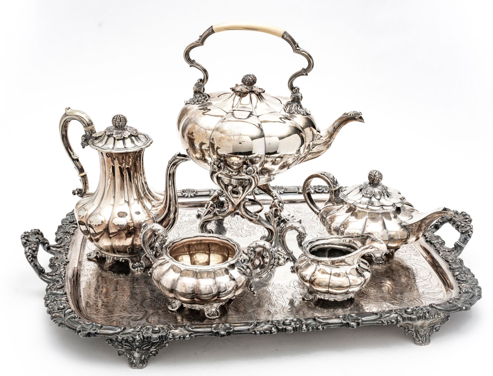 English Sheffield Plate Silver Coffee and Tea Service, 5 Pcs. Plus Tray: ENGLISH SHEFFIELD PLATE SILVER COFFEE AND TEA SERVICE, 5 PCS. PLUS TRAY Melon and leaf form design tea set. Coffee pot, tea pot, water kettle on warmer, creamer and sugar, All pieces footed plus foote