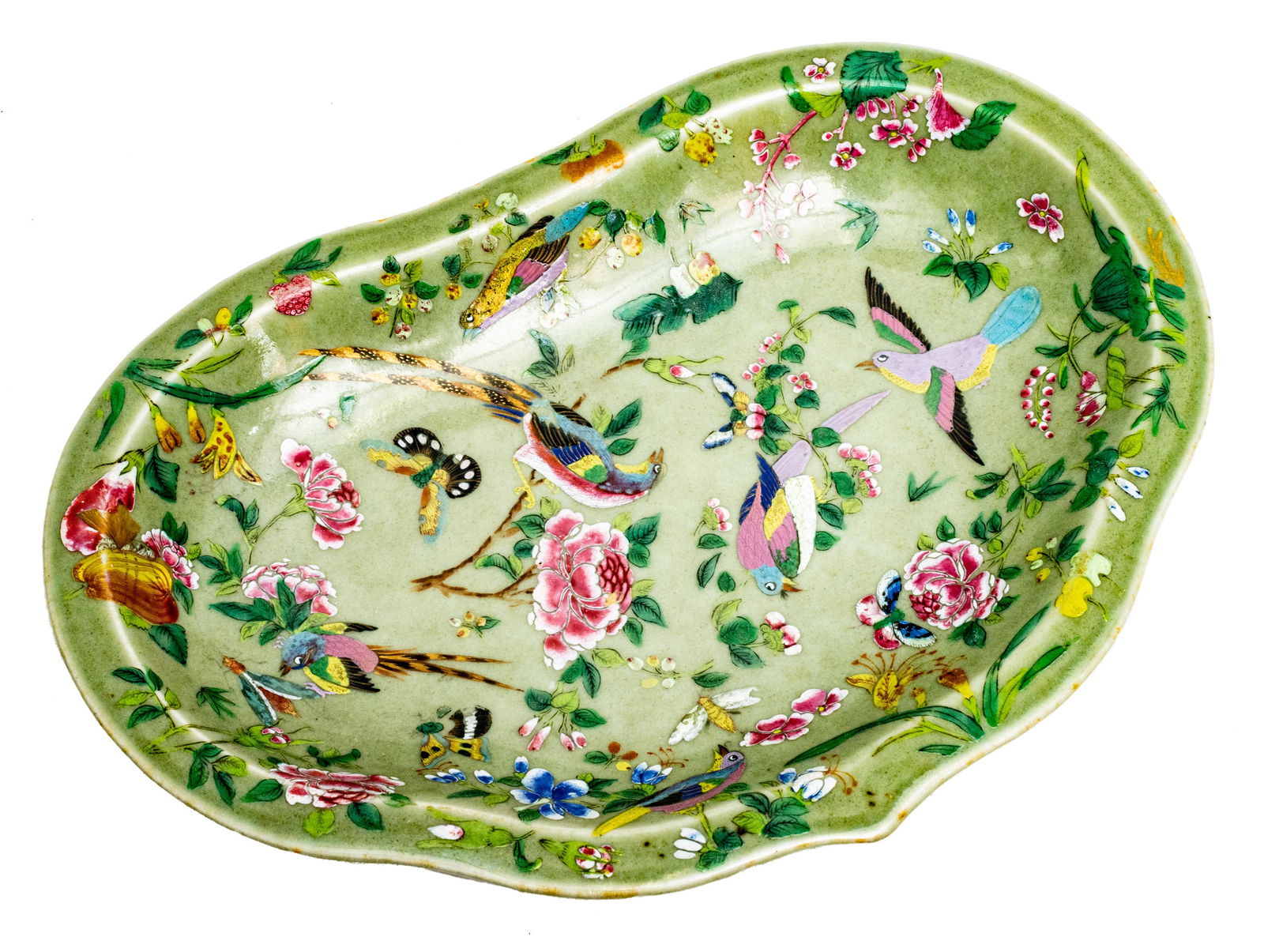 Chinese Celadon Porcelain Dish, W 8”, L 11.5”: CHINESE CELADON PORCELAIN DISH, W 8", L 11.5" A hand-painted Chinese celadon porcelain dish. Having peony, lotus, and avian forms hand-painted to the basin. No markings to the underside. Property from