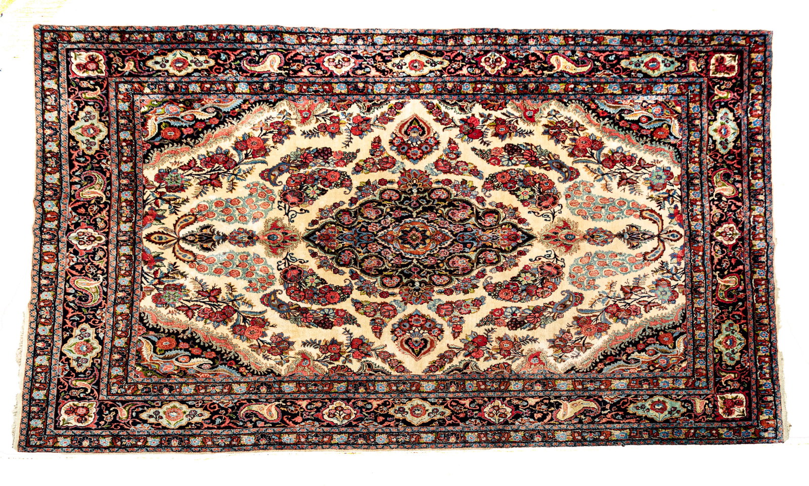 Persian Yazd Handwoven Wool Rug, C. 1960, W 10’, L 13’ 6”: PERSIAN YAZD HANDWOVEN WOOL RUG, C. 1960, W 10', L 13' 6" Finely woven Persian Yazd rug having a bracketed ivory central field with a black outer border.