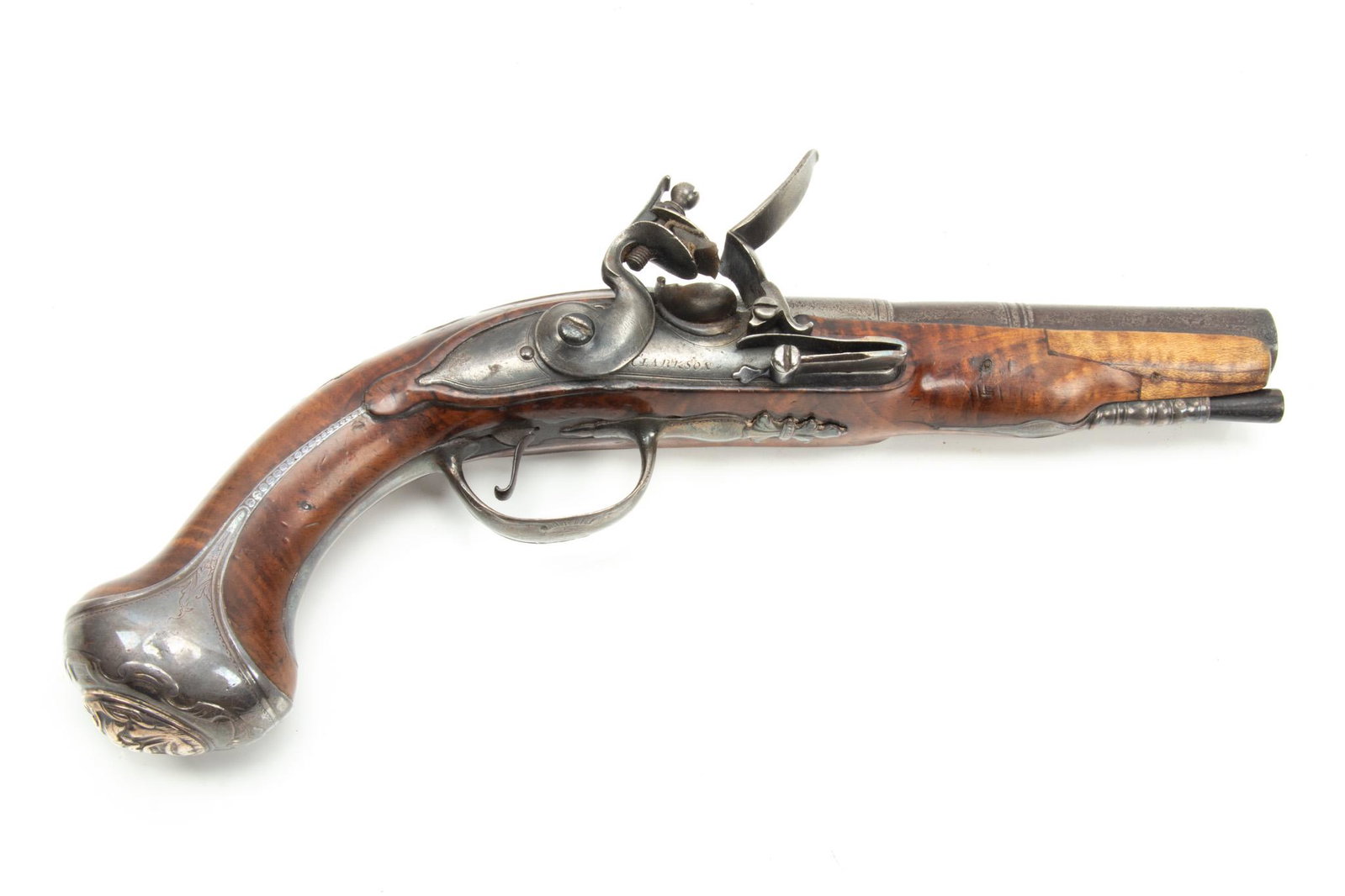Joseph Clarkson, British Silver Mounted Flintlock Pistol, 18th C., L 6” Barrel: JOSEPH CLARKSON, BRITISH SILVER MOUNTED FLINTLOCK PISTOL, 18TH C., L 6" BARREL Marked 'Clarkson' at the lock with illegible markings at the top of the barrel and proof marks at the side of the barrel.