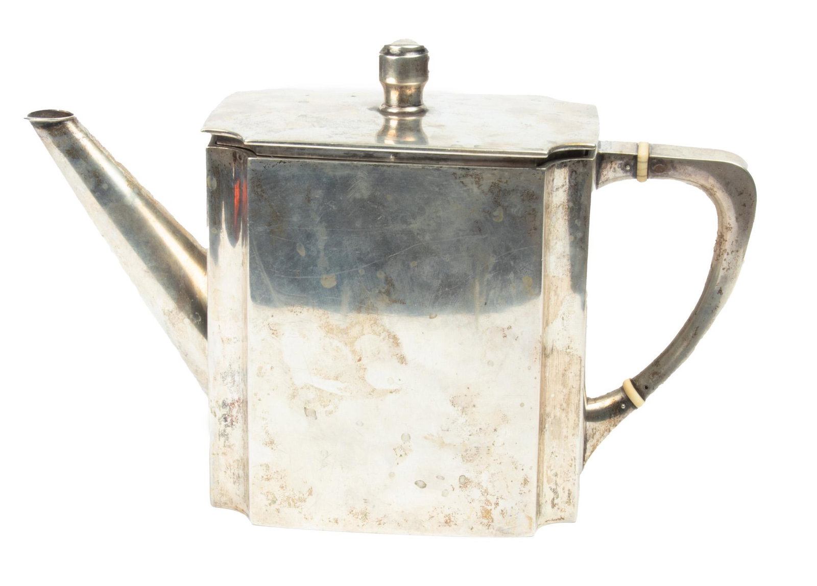 Sterling Silver Tea Pot, Maker “JB” C 1940 H 5 1/2” L 8” 16.6 TR Oz: STERLING SILVER TEA POT, MAKER "JB" C 1940 H 5 1/2" L 8" 16.6 TR OZ Hallmark with "JB" and flower in circle. Modern design. Hinged cover. 16.6 tr oz.