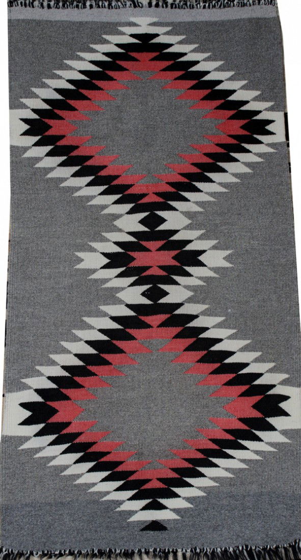 NAVAJO INDIAN RUG, 41" X 21": NAVAJO INDIAN RUG, 41" X 21":hand woven circa 1900. Grey ground, diamond forms in white, black and pink Wrong size. size on tag is 20" x 39" ??????