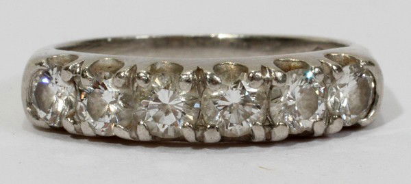 PLATINUM & DIAMOND RING: PLATINUM & DIAMOND RING:Set with 6 small mine cut diamonds, .08ct. Weighing approximately 3.6 grams. From the Estate of Gloria Vuici - Smith, Grosse Pointe, Mi.