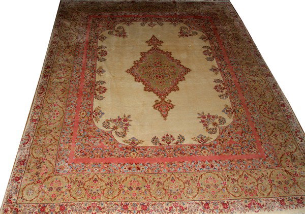 KERMAN IRANIAN CARPET, CIRCA 1920, 8' X 10' 1": KERMAN IRANIAN CARPET, CIRCA 1920, 8' X 10' 1":With ivory field, center medallion and green border.