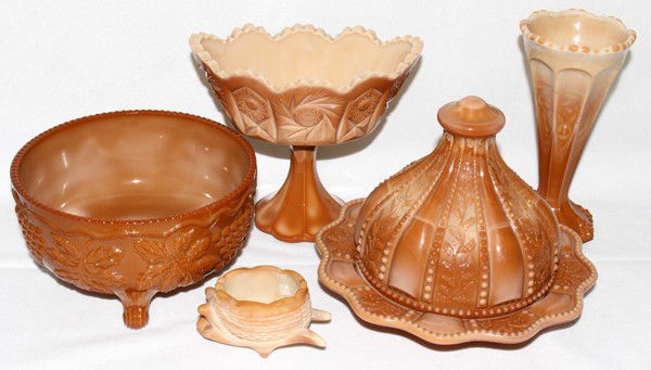 CHOCOLATE GLASS TABLEWARE, FIVE, H 2" - 6": CHOCOLATE GLASS TABLEWARE, FIVE, H 2" - 6":Including 1 covered butter dish, 1 vase, 1 compote, 1 centerpiece bowl and 1 open salt.