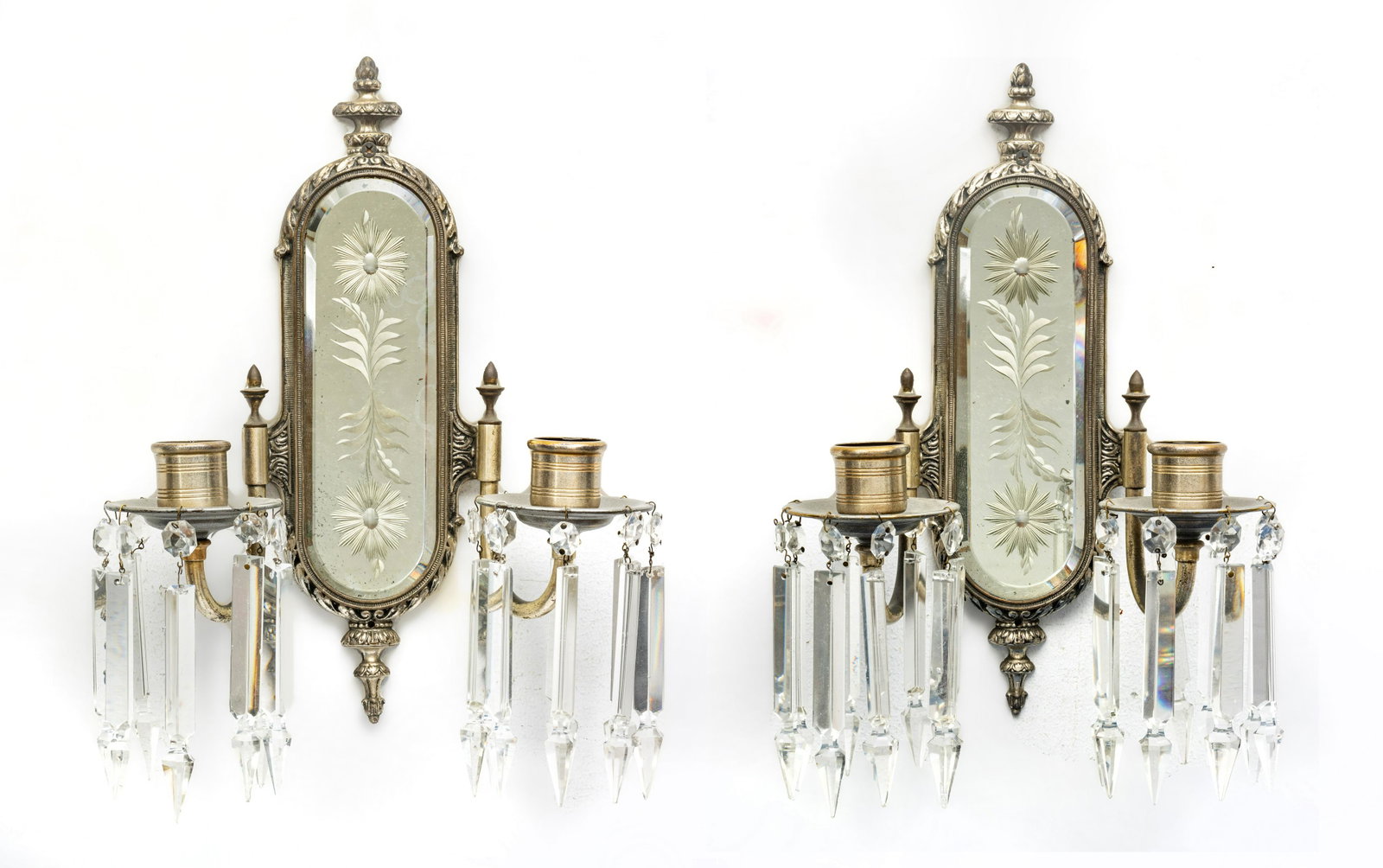 Pair Of Bronze Mirror Backed Two Light Sconces, C. 1940, H 11'' W 11'' Depth 4.5'': Pair Of Bronze Mirror Backed Two Light Sconces, C. 1940, H 11'' W 11'' Depth 4.5'' Crystal prisms. Not electrified. Property from a Clay, MI private home. Provenance: From a Lathrop Village, Michigan 