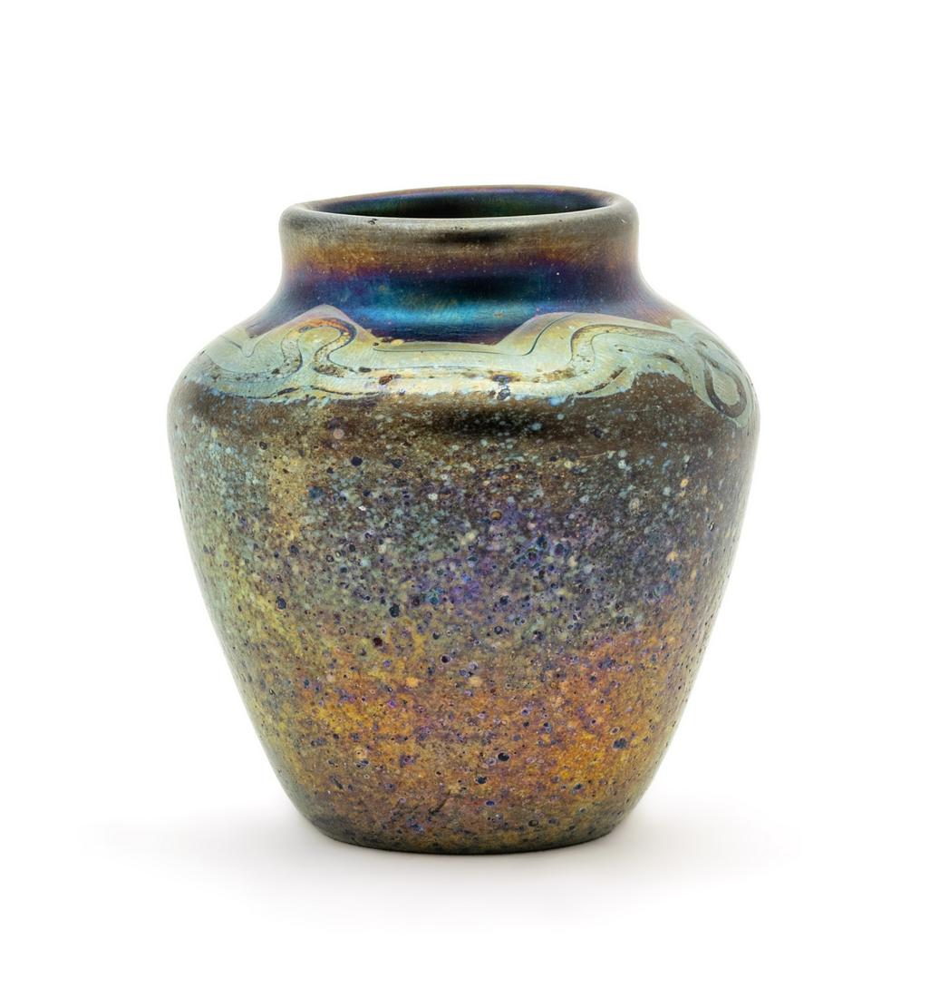 Tiffany Studios (American, 1878-1938) Tiffany Favrile Iridescent Small Vase H 2.5'' Dia. 2.25'': Tiffany Studios (American, 1878-1938) Tiffany Favrile Iridescent Small Vase H 2.5'' Dia. 2.25'' Label affixed to underside. Marked "L.C. T. N527i" on underside. Vase has a dark base with green design 