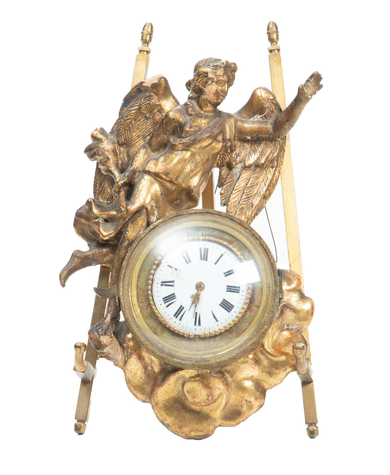 Italian Antique Carved Wood And Bronze "angel" Clock 19th.c., H 7'' W 5'': Italian Antique Carved Wood And Bronze "angel" Clock 19th.c., H 7'' W 5'' Carved gold leaf case with angel Gabriel surmounting round metal frame and enamel dial. Roman numerals. Possible fusee movemen