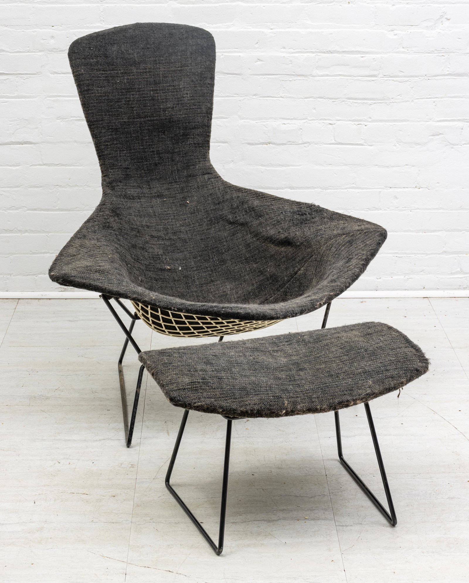 Harry Bertoia (American, 1915-1978) For Knoll Woven Fabric Bird Chair And Ottoman 1960, H 39'' W: Harry Bertoia (American, 1915-1978) For Knoll Woven Fabric Bird Chair And Ottoman 1960, H 39'' W 37'' Paper label fixed to underside. Black/Deep Gray woven fabric. Ottoman H 13", L 24", W 16.