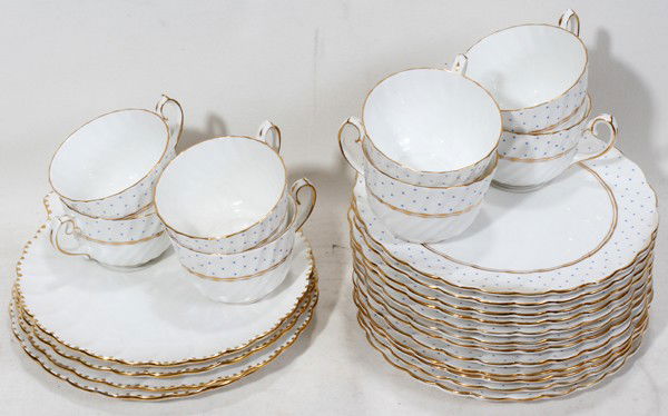 GLADSTONE PORCELAIN TEA CUPS & TOAST PLATES,: GLADSTONE 'OLD GRECIAN FLUTE' & 'POLKA DOT' PORCELAIN TEA CUPS & TOAST PLATES, 24 PIECES:"Polka Dot" pattern includes 8 tea cups, H. 2 1/2", and 12 toast plates, W. 8 3/4" and 4 "Old Grecian Flute" pa
