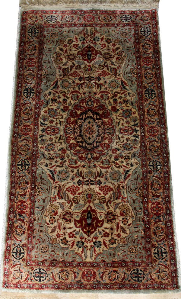KESHAN SILK RUG, 3' 2" X 1' 7": KESHAN SILK RUG, 3' 2" X 1' 7":Central medallion and overall flowering pattern in shades red and tan.
