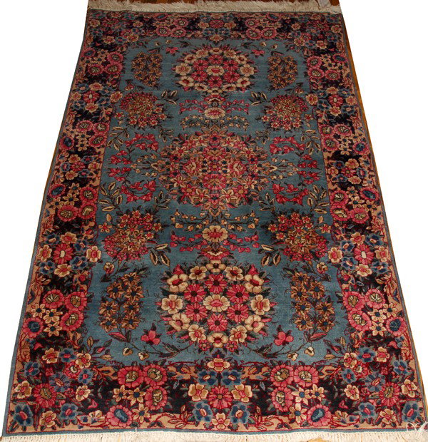 KERMAN WOOL IRANIAN RUG, 6' 2" X 4' 0": KERMAN WOOL IRANIAN RUG, 6' 2" X 4' 0":Having an overall floral design.