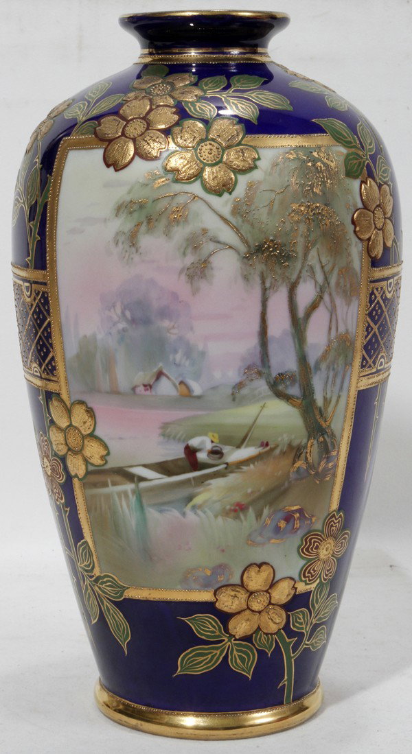NIPPON PORCELAIN VASE, C. 1900, H 12": NIPPON PORCELAIN VASE, C. 1900, H 12":Cobalt blue, with two hand painted scenes one on front and one on reverse. Raised gilding.