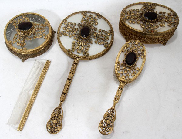 GILT METAL & AMETHYST GLASS FANCY DRESSER SET,: GILT METAL & AMETHYST GLASS FANCY DRESSER SET, FIVE PIECES:Includes hand mirror, 2 dresser boxes, comb, hairbrush. Circa 1940