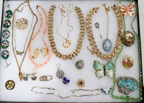 AUSTRIAN CUT CRYSTAL NECKLACE, BROOCHES ETC: AUSTRIAN CUT CRYSTAL NECKLACE CERAMIC BROOCHES ETC:Assorted jewelry lot. Ceramic brooches include Wedgwood. Coral necklace. From the Estate of Gloria Vuici - Smith, Grosse Pointe, Mi.