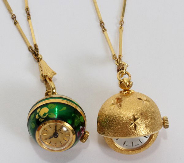 SWISS BUCHERER WATCHES ON METAL CHAINS TWO: SWISS BUCHERER WATCHES ON METAL CHAINS TWO:29" chain From the Estate of Gloria Vuici - Smith, Grosse Pointe, Mi.