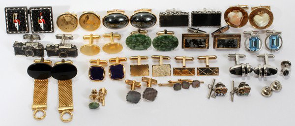 CUFFLINKS, 15 PAIRS: CUFFLINKS, 15 PAIRS:Includes Jaguar cabochon gold filled, sterling "Destino" topaz, Dante "Capricorn", sterling "camera" and Swank stud set.