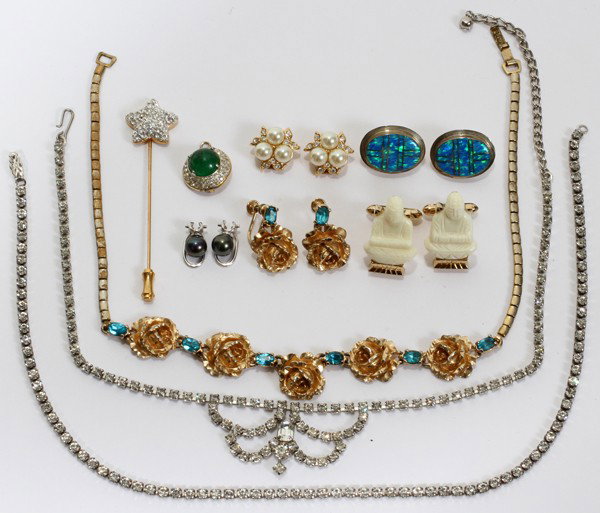 SWAROVSKI EARRINGS, 2 PAIRS, IVORY CUFFLINKS &: SWAROVSKI EARRINGS, 2 PAIRS, IVORY CUFFLINKS AND OTHERS:Includes 2 pairs of Swarovski earrings, a Swarovski stick pin, a pair of Pierre Cardin ivory Buddha cufflinks, 3 necklaces and one pair of earri