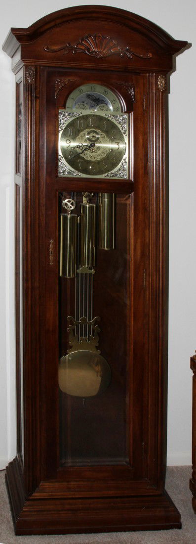 SETH THOMAS GRANDFATHER CLOCK PINE: SETH THOMAS GRANDFATHER CLOCK PINE WITH WALNUT FINISH H 82", W 21", D 11":Arabic numerals. Three key wind, pendulum, with chimes.