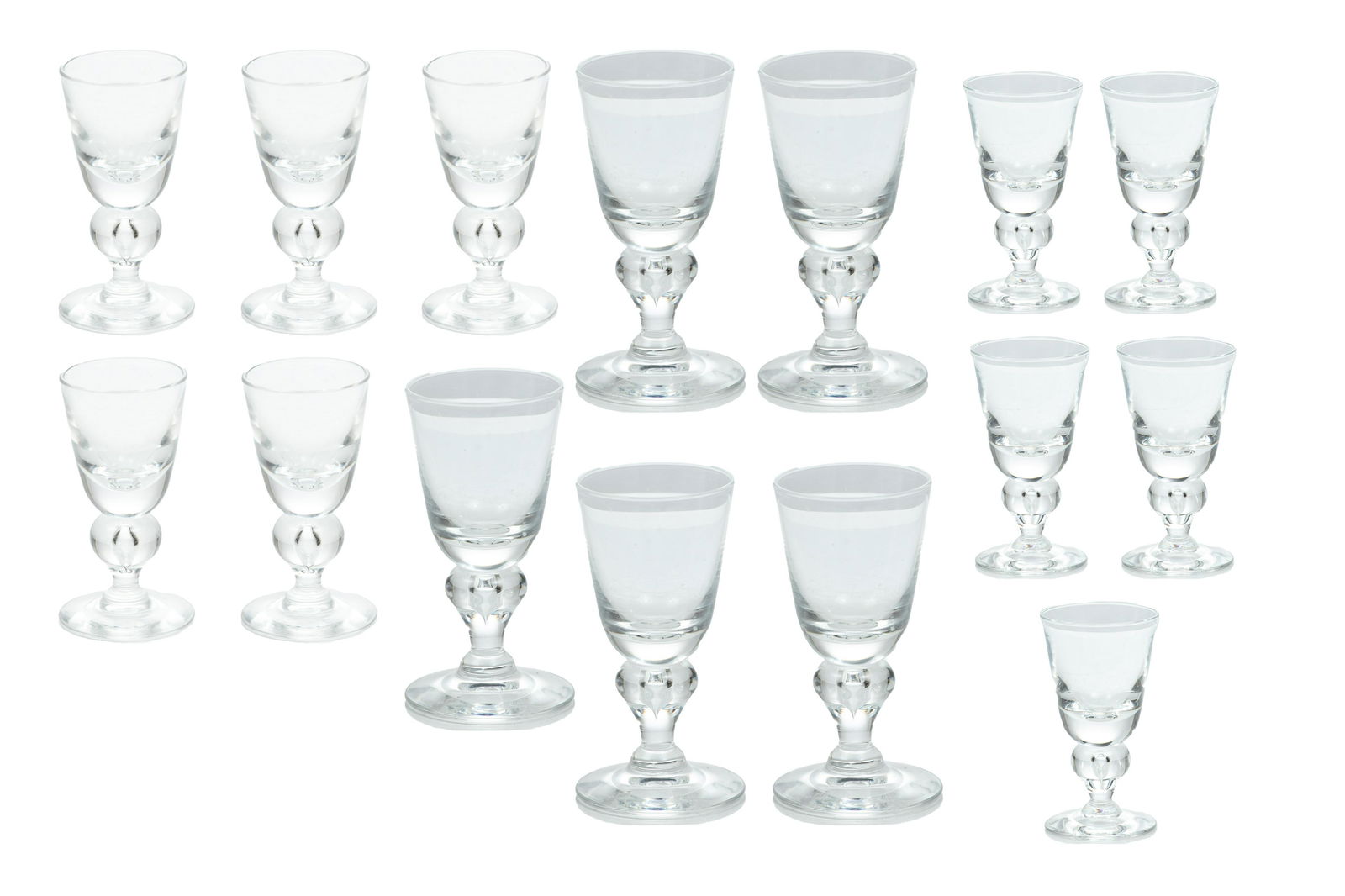 Steuben Crystal Wine, Sherry & Cordial Glasses, H 5.5'' Dia. 2.75'' 18 pcs: Steuben Crystal Wine, Sherry & Cordial Glasses, H 5.5'' Dia. 2.75'' 18 pcs A collection of Steuben stemware with baluster stems and suspended air bubbles. Includes six claret wine glasses, two sherry
