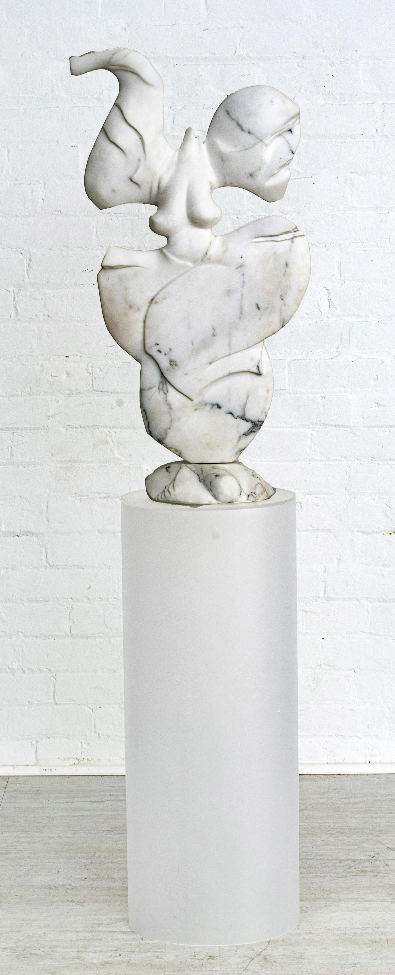 Fritz Olsen (American) Carved Marble Sculpture H 30.25", W 15", D 9": Fritz Olsen (American) Carved Marble Sculpture H 30.25", W 15", D 9" Sculpted By Fritz Olsen Of Sawyer, Michigan. White Marble Sculpture With Plastic Display Pedestal H 30", Dia 12".