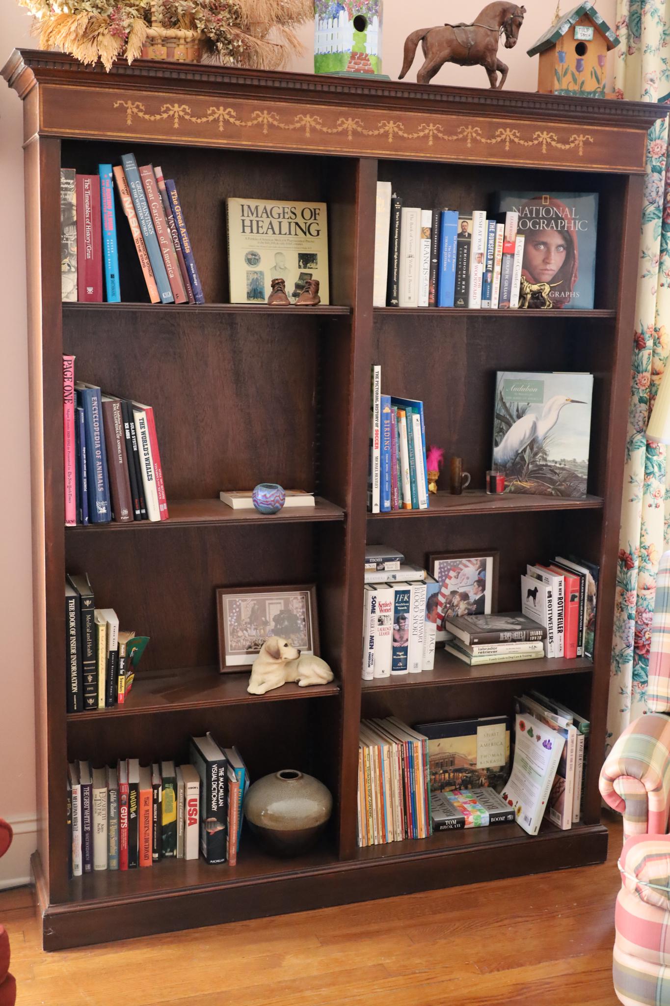 Mahogany Two Section Bookcase, H 81.5'' W 65'' Depth 14'': Mahogany Two Section Bookcase, H 81.5'' W 65'' Depth 14'' Six shelves, bell flower frieze.