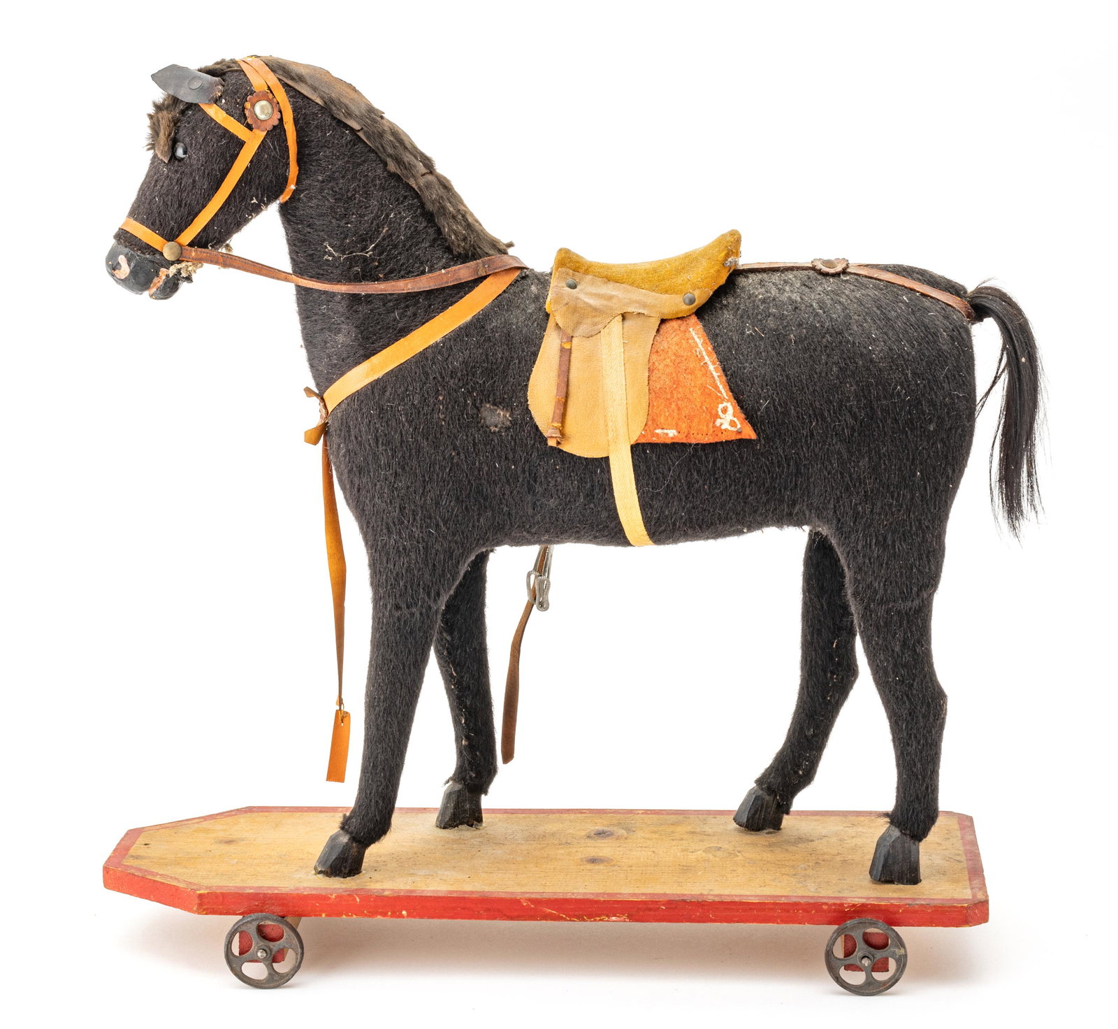 19th Century Horse Pull Toy H 18'' W 6.5'' L 18'': 19th Century Horse Pull Toy H 18'' W 6.5'' L 18'' Stirrups need to be re-attached.