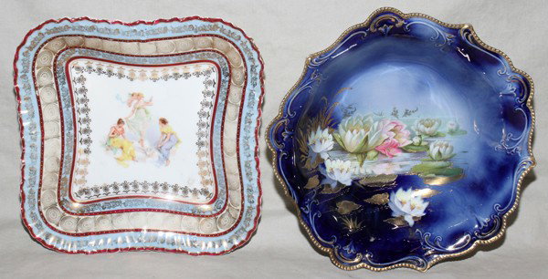 GERMAN PORCELAIN BOWLS, C. 1900, TWO: GERMAN PORCELAIN BOWLS, C. 1900, TWO:One hand painted with water lilies against royal blue ground. Second with interior scene at well. One marked Wheelock.