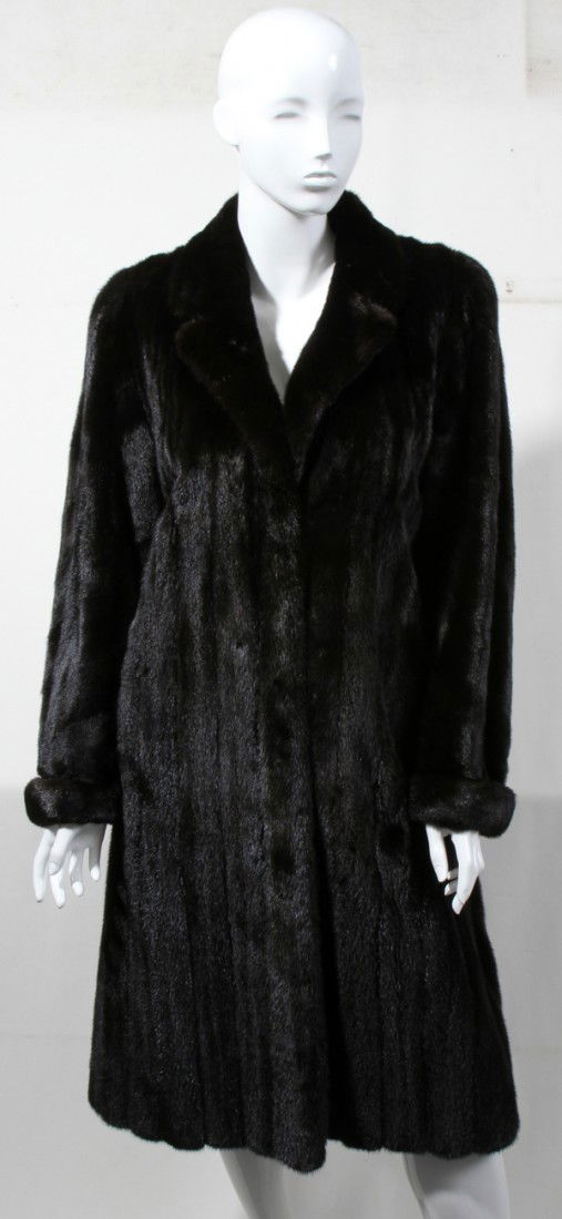 BLACK RANCH MINK COAT: BLACK RANCH MINK COAT:Approximate size 8/10, sweep 66", length 48". Retailed by Wrubel & Kozin Birmingham, MI.
