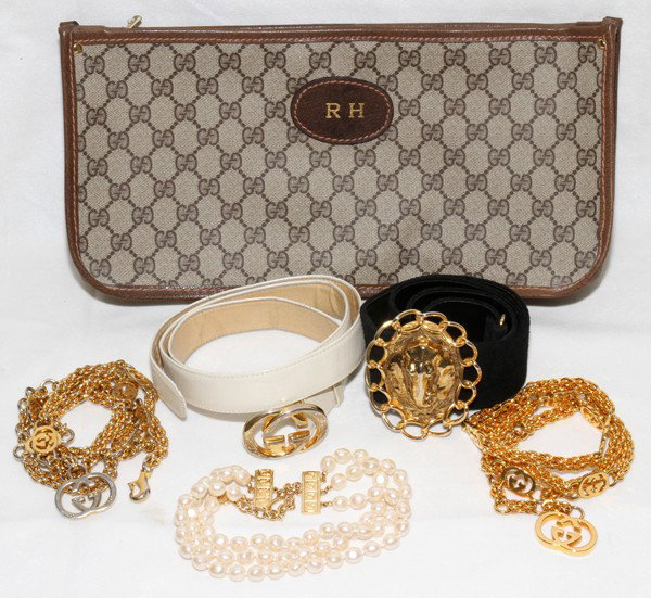 GUCCI ACCESSORIES, FIVE, & A MISS DIOR BELT: GUCCI ACCESSORIES, FIVE, & A MISS DIOR BELT:Including 1 Gucci fabric zippered case, L. 14", 1 Gucci necklace, 2 Gucci link belts, L. 38", 1 leather belt together with 1 Miss Dior suede belt with eleph