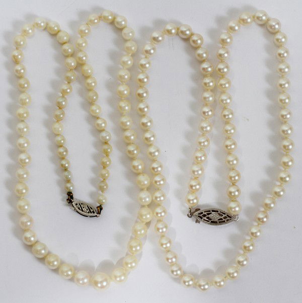 CULTURED PEARL NECKLACES, TWO, L 15": CULTURED PEARL NECKLACES, TWO, L 15":15" clasp marked 14kt. Also cultured 15" cultured pearl necklace with clasp marked 10kt. S. From the Estate of Gloria Vuici - Smith, Grosse Pointe, Mi.