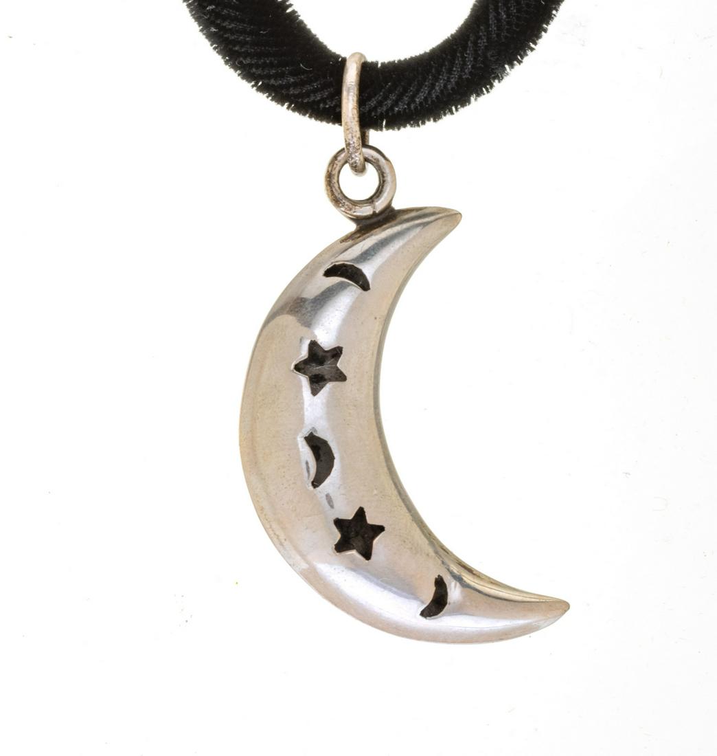 Sterling Silver Crescent Moon On Black Cord L 14'': Sterling Silver Crescent Moon On Black Cord L 14'' Pendent impressed 925. In box.