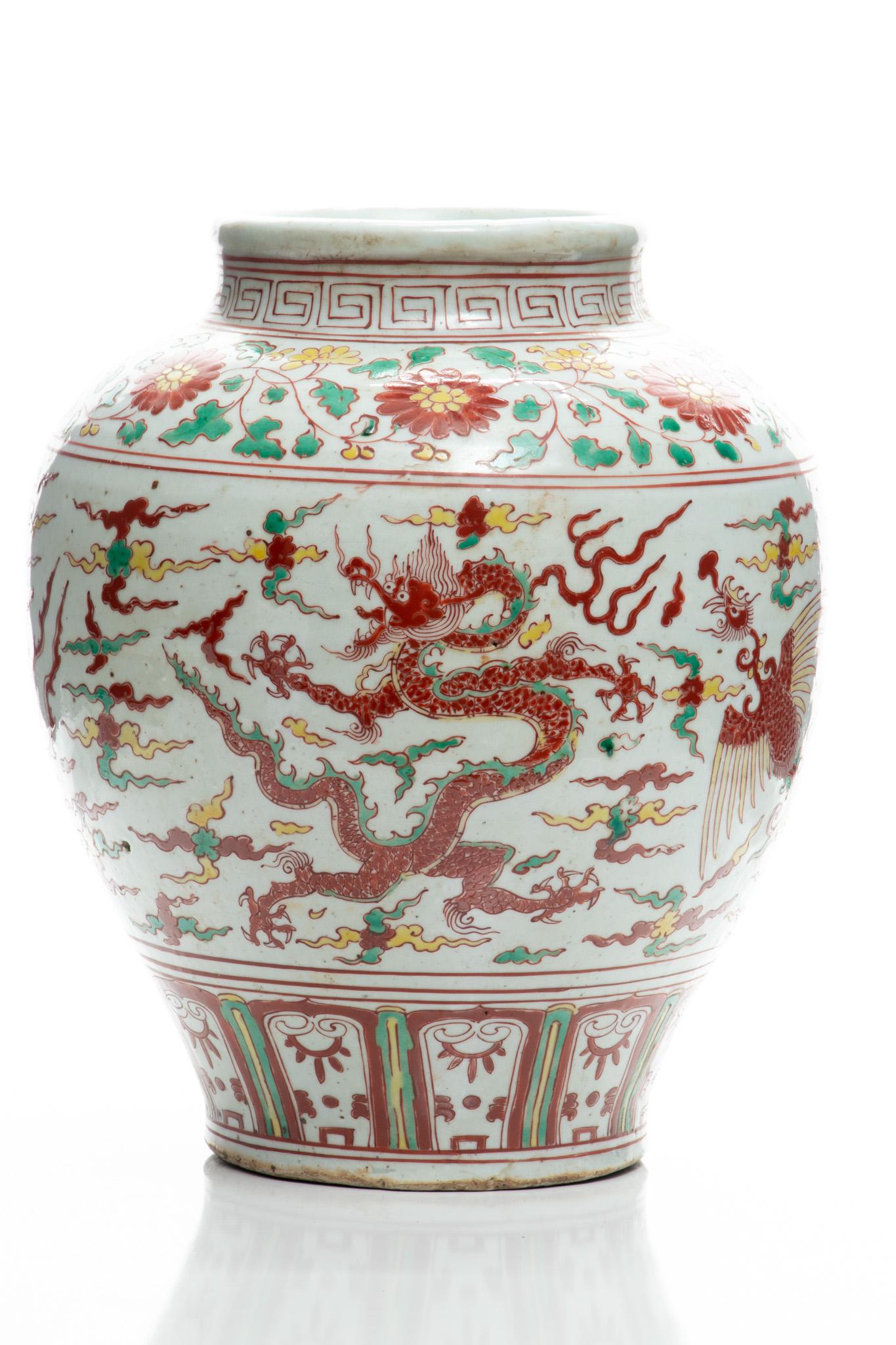Chinese Wucai Jar, H 11'' Dia. 10'': Chinese Wucai Jar, H 11'' Dia. 10'' A Chinese Wucai porcelain jar. Offers dragon and atmospheric motifs to the bodice in the round. No artist's marks to the underside observed.