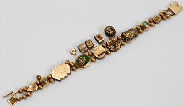 14 KT YELLOW GOLD SLIDE BRACELET: 14 KT YELLOW GOLD SLIDE BRACELET:Having ball form between slides with various semi-precious stones, five extra slides with two gold balls. Unmarked.