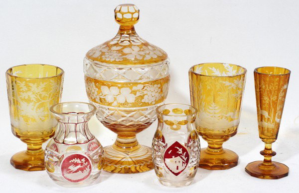 BOHEMIAN AMBER OVERLAY, SIX PIECES, CIRCA 1900: BOHEMIAN AMBER OVERLAY, SIX PIECES, CIRCA 1900:One covered jar, 8", three beakers, 4 1/2", running stag and vintage motif with two small overlay vases, 3 1/2"