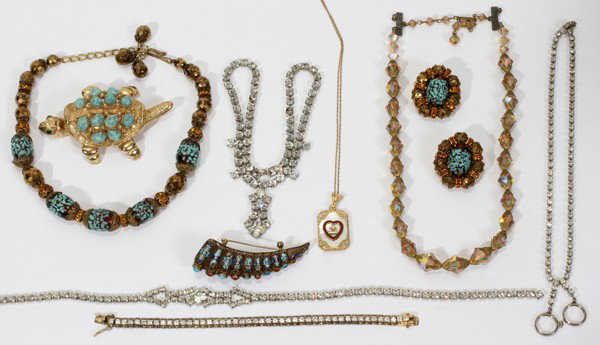 COSTUME JEWELRY COLLECTION, TEN PIECES: COSTUME JEWELRY COLLECTION, TEN PIECES:Collection includes a vintage Fraternal Order of Eagles heart sweater pin mounted into a necklace, a faux diamond bracelet plus three chokers [two of which are H