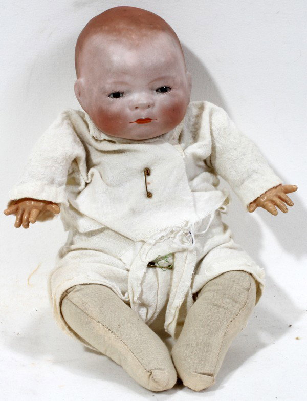 GRACE PUTNAM BISQUE HEAD BYE - LO DOLL, H 11": GRACE PUTNAM BISQUE HEAD BYE - LO DOLL, H 11":signed on back of head, cloth body.
