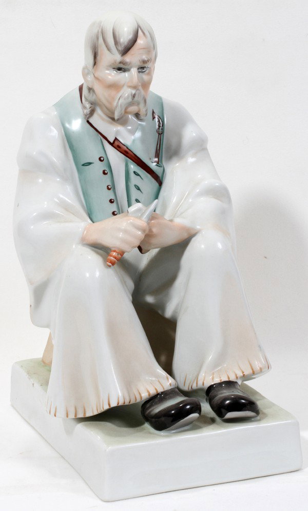 ZSOLNAY PORCELAIN MAN CUTTING BACON, H 13": ZSOLNAY PORCELAIN MAN CUTTING BACON, H 13":From the Estate of Mary Grace Pribanyec, Lincoln Park. From the Estate of Mary Grace Pribanyec, Lincoln Park, Mi.