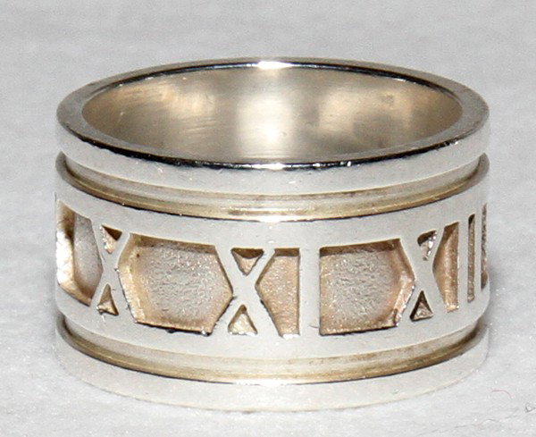 TIFFANY & CO. STERLING RING, & A PEWTER BOX, : TIFFANY & CO. STERLING SILVER RING, & A TIFFANY & CO. PEWTER BOX, DIA 4":Including 1 ring marked "Tiffany & Co. 925 Italy" and 1 pewter box marked "Handcrafted Pewter by Tiffany & Co.". Box inscribed 