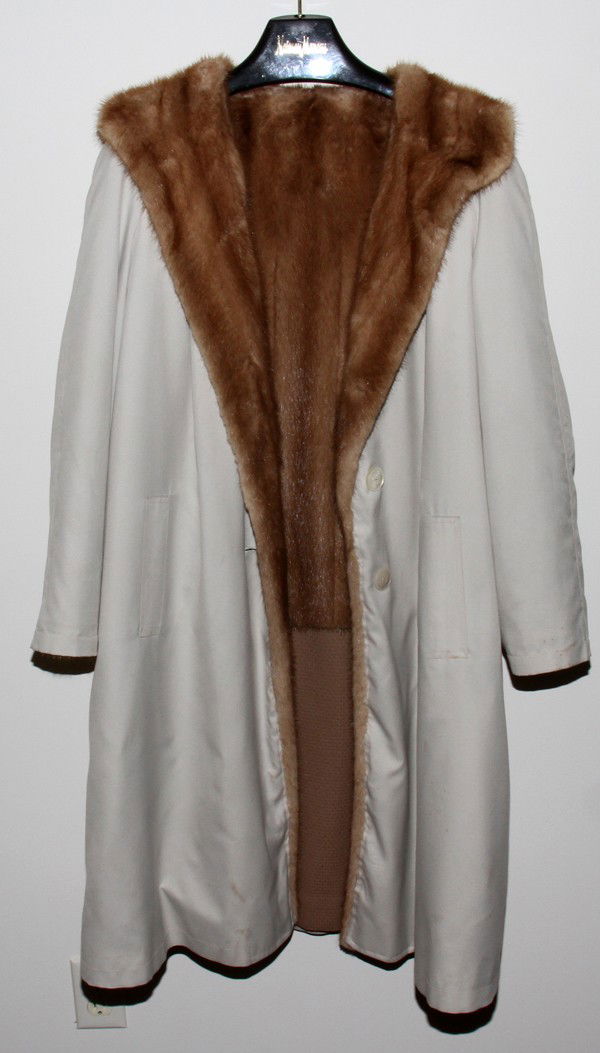 MINK LINED RAIN COAT, 42" FROM SHOULDER TO HEM: MINK LINED RAIN COAT, 42" FROM SHOULDER TO HEM:Light brown mink lining with khaki color exterior. No apparent labels.